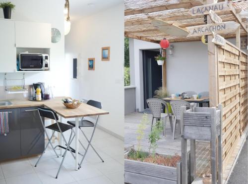 een keuken en een buitenkeuken met een tafel en stoelen bij Le Porge Beach House - 4 people in Le Porge