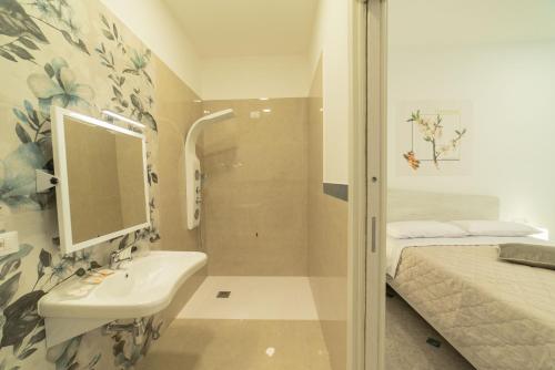 Koupelna v ubytování B&B MANDORLO BIANCO
