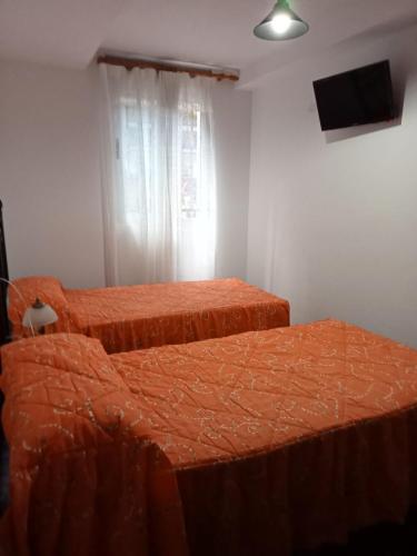 Postel nebo postele na pokoji v ubytování Apartamento As Irmas