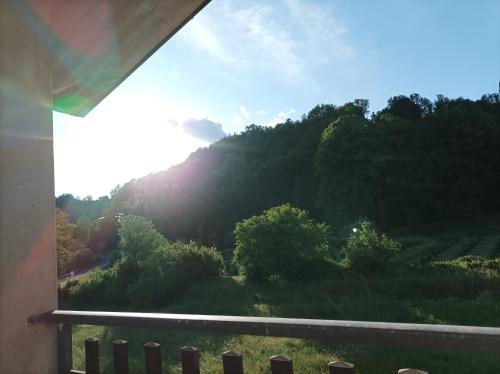 a view of a mountain from a window at La Sosta in Lunigiana in Monti di Licciana Nardi