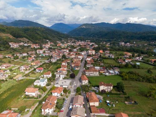 an aerial view of a small town in the mountains at La Sosta in Lunigiana in Monti di Licciana Nardi