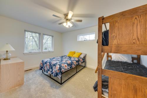 a bedroom with a bunk bed and a bunk bed at Lakefront Burlington Vacation Rental Dock and Beach in Twin Lakes