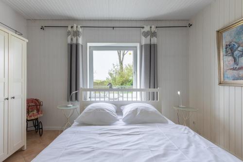 Postel nebo postele na pokoji v ubytování Haus am See