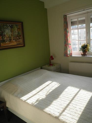 Katil atau katil-katil dalam bilik di Apartment Descamps
