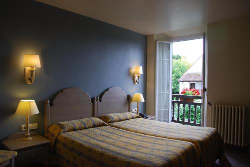 Ліжко або ліжка в номері Hotel Rural Loizu