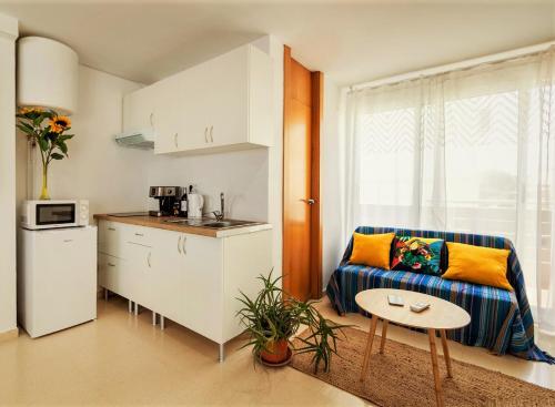 Kuchyňa alebo kuchynka v ubytovaní Penthouse Duplex in a 4 floors spanish house -8 min to center by Metro