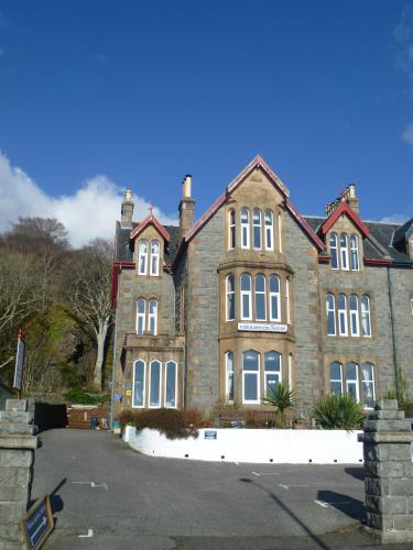 a large brick building with a lot of windows at Corriemar House in Oban