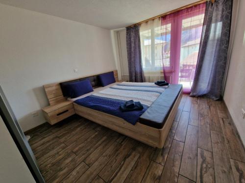 Postel nebo postele na pokoji v ubytování Family friendly Apartment in the heart of Interlaken