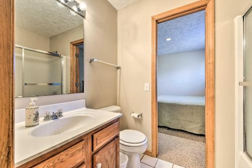 a bathroom with a sink and a toilet at Ski-InandSki-Out Ghent Cabin with Mountain Views! in Ghent