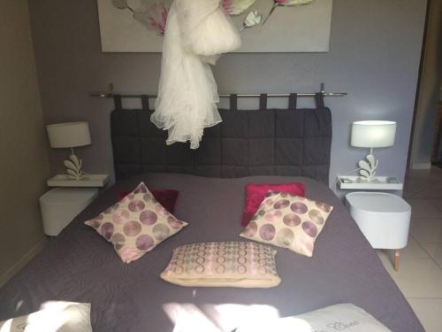 Posteľ alebo postele v izbe v ubytovaní La charmante Villa Coco avec magnifique vue mer