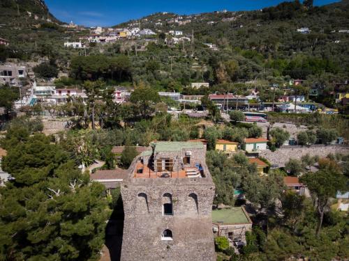 an old building in the middle of a town at Villaggio Residence Nettuno in Massa Lubrense