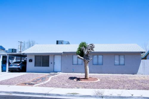 a house with a tree in front of it at House in Las Vegas in Las Vegas