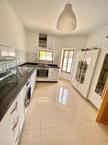Η κουζίνα ή μικρή κουζίνα στο Villa AGADIR pas cher