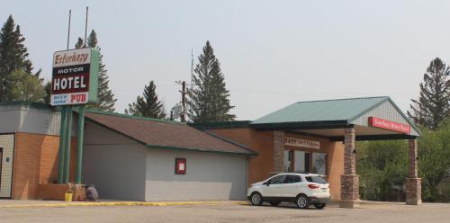 a car parked in front of a motel at Esterhazy Motor Hotel in Esterhazy