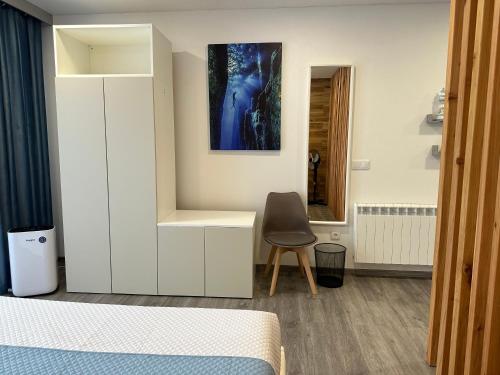 Ένα ή περισσότερα κρεβάτια σε δωμάτιο στο Paradise Apartments II