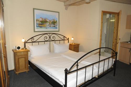 Krevet ili kreveti u jedinici u okviru objekta Hotel Goldener Karpfen