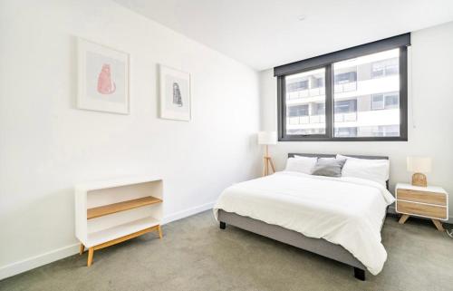 Katil atau katil-katil dalam bilik di Modern Clayton apartment close to uni and hospital