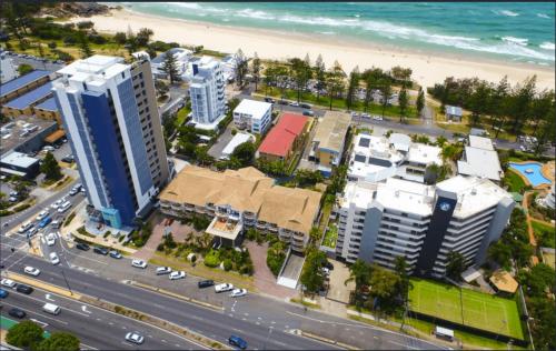 an aerial view of a city with a beach and buildings at Outrigger Burleigh in Gold Coast