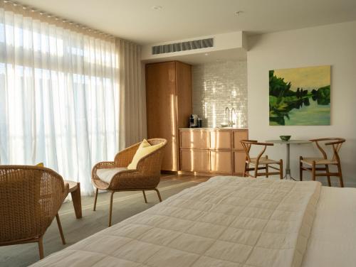 Krevet ili kreveti u jedinici u objektu Porters Boutique Hotel