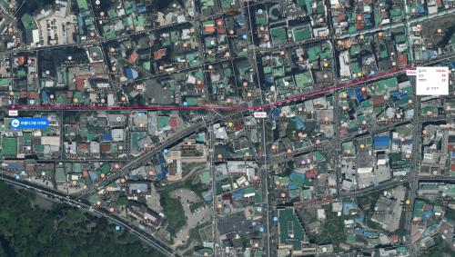 a map of a city with roads and buildings at Hotel The Grang Seogwipo in Seogwipo