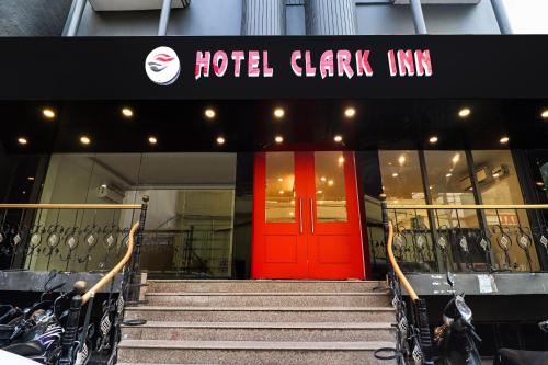 a red door in the front of a building at OYO Townhouse 79957 Oyo Townhouse 411 Hotel Clark Inn in Patna