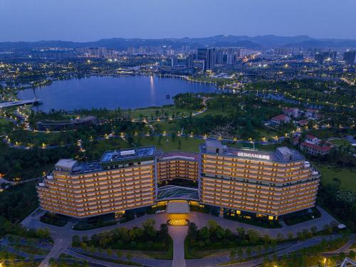 an aerial view of a hotel with a large building at Mumian Chengdu Dong'an Lake in Chengdu