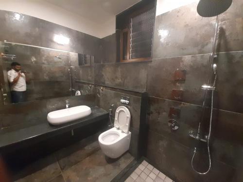 Kylpyhuone majoituspaikassa Biranji Aqua Retreat