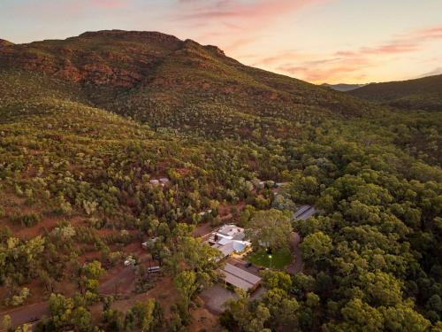 an aerial view of a house in the middle of a mountain at Discovery Resorts - Wilpena Pound in Flinders Ranges