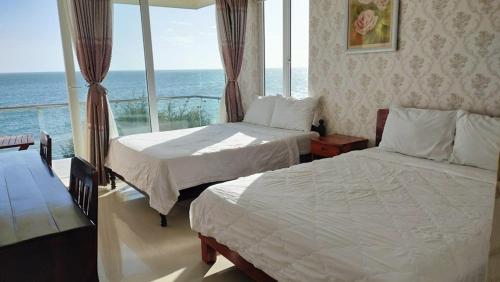 Ένα ή περισσότερα κρεβάτια σε δωμάτιο στο Hai Yen Family Hotel