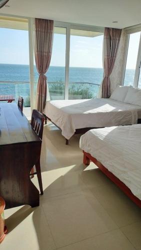 Ένα ή περισσότερα κρεβάτια σε δωμάτιο στο Hai Yen Family Hotel