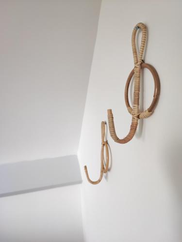 a piece of rope hanging on a wall at Guesthouse at the Amstel river with 2BR 2BA and garden in Amstelveen
