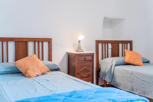 Postel nebo postele na pokoji v ubytování Son Maimo