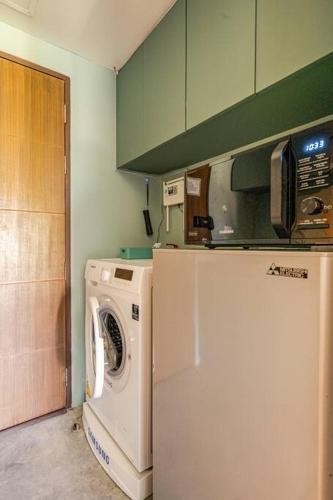 Η κουζίνα ή μικρή κουζίνα στο Dreamcatcher Condo/ Replay Condominium