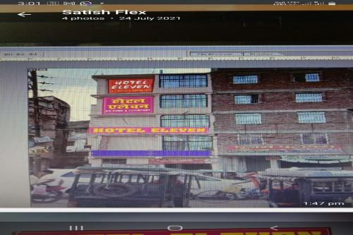 a computer screen with a picture of a building at OYO Hotel Eleven in Bhāgalpur