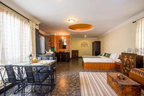 Posezení v ubytování Bouddha Green Hotel