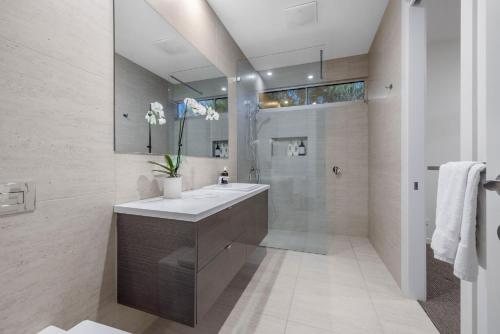 a bathroom with a sink and a shower at Marvellous Montfort in Blairgowrie