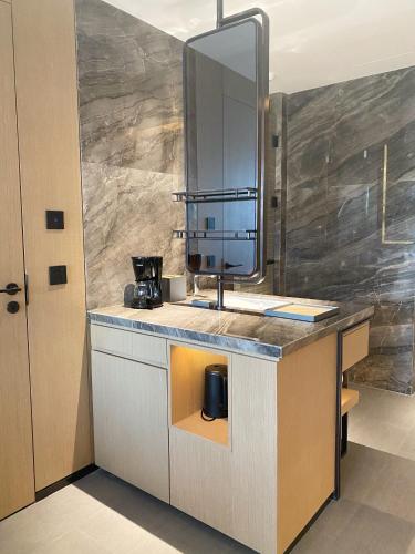 Η κουζίνα ή μικρή κουζίνα στο Four Points by Sheraton Suzhou, Wuzhong