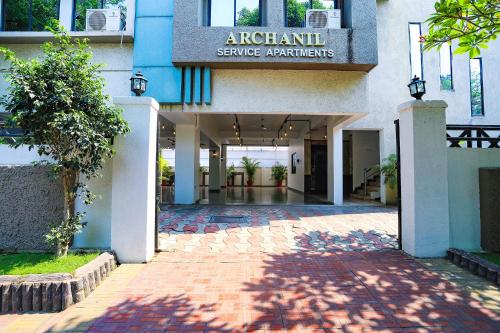 a building with a sign that reads argentinian service apartments at FabHotel Archanil Apartment - Sitanagar Cricket Ground in Nagpur