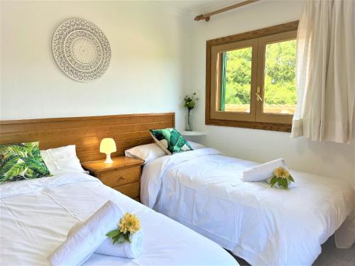 Postel nebo postele na pokoji v ubytování Ideal Property Mallorca - Madona - Es Puig
