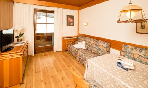 Postel nebo postele na pokoji v ubytování Residence Tolderhof - OlangCard included