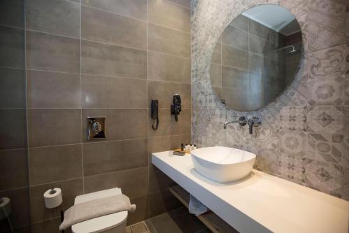 Ένα μπάνιο στο DeLight Luxury Rooms
