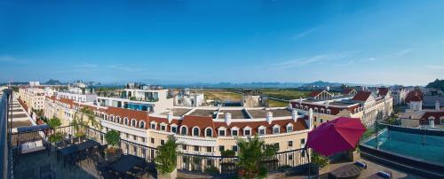 an overhead view of a city with a building at The Yen Residences Halong in Ha Long