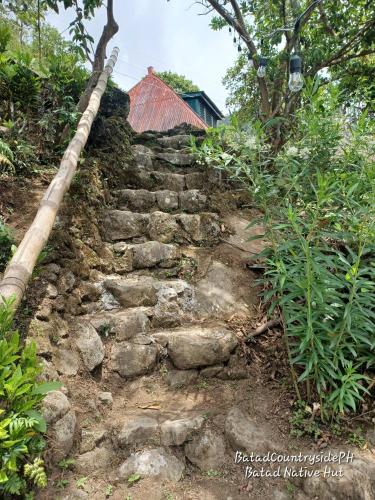 an old stone stairway leading up to a house at Batad Countryside in Banaue