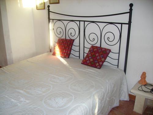 Łóżko lub łóżka w pokoju w obiekcie Casine degli Ulivi