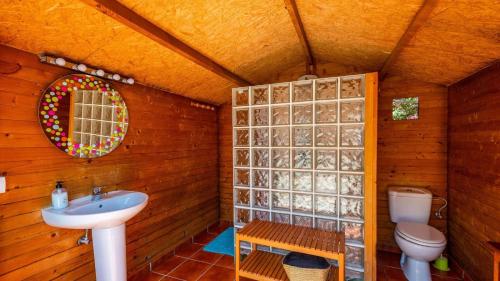 a bathroom with a sink and a toilet at Casa Azahar Jimena de la Frontera by Ruralidays in Jimena de la Frontera