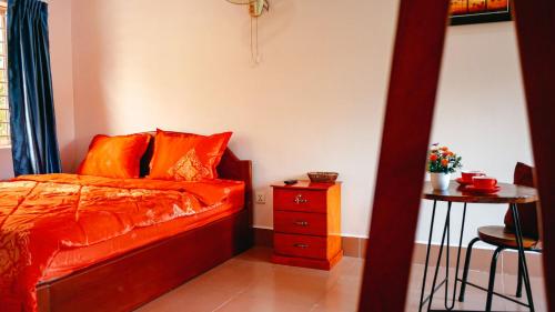 Ένα ή περισσότερα κρεβάτια σε δωμάτιο στο Lea's Guesthouse and Restaurant