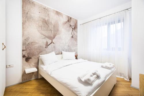 Postel nebo postele na pokoji v ubytování Luxury Pipera