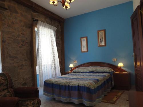Postel nebo postele na pokoji v ubytování Casa típica de mariscadores
