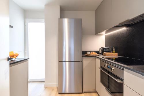 Dapur atau dapur kecil di Arrivo Apartments