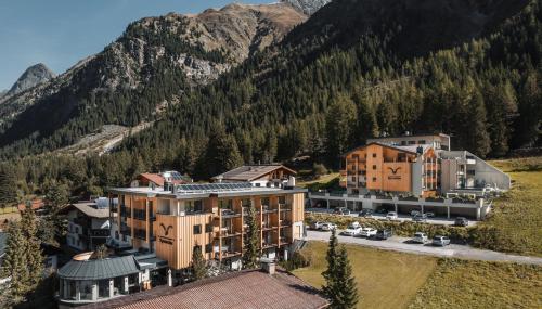 an aerial view of a resort in the mountains at Alpine Resort Sportalm in Sankt Leonhard im Pitztal
